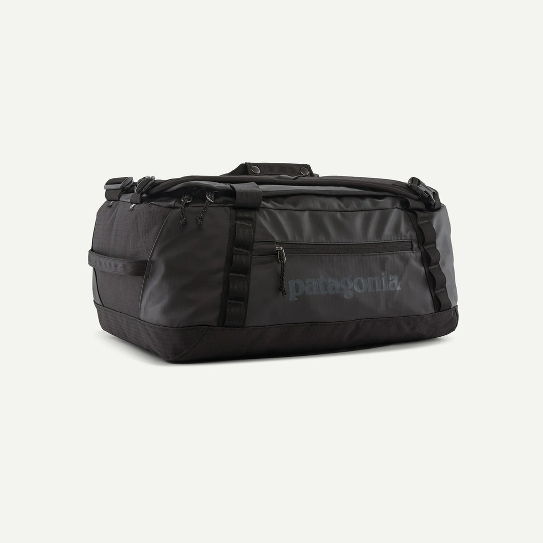 Black duffel bag with Patagonia logo on a white background