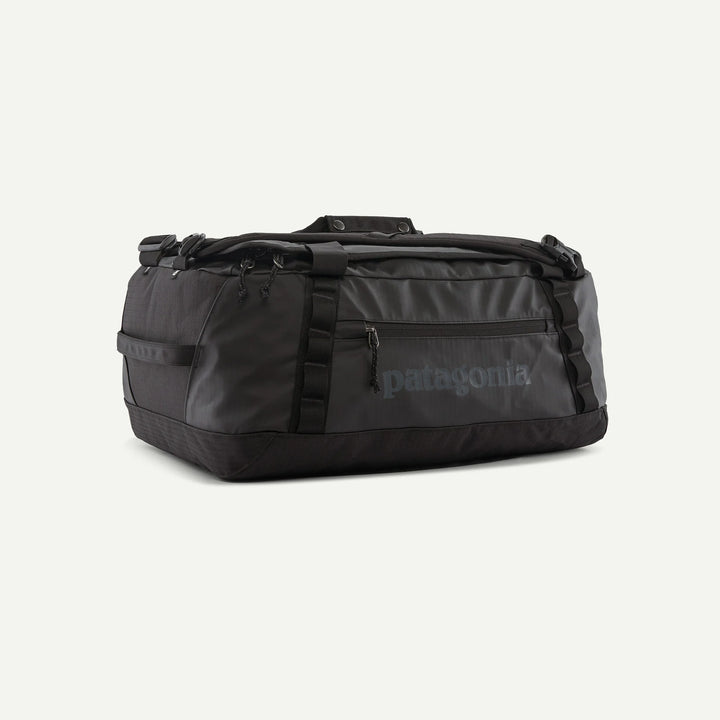 Black duffel bag with Patagonia logo on a white background