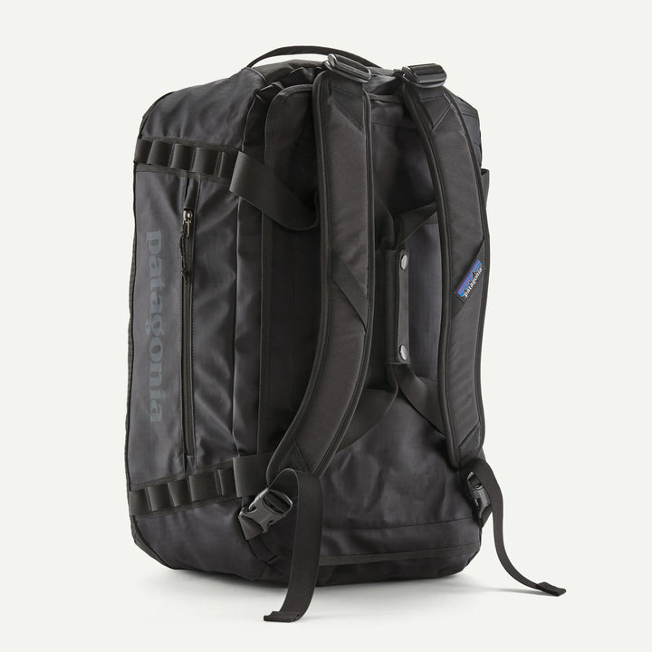 Black backpack with visible Patagonia branding on a white background
