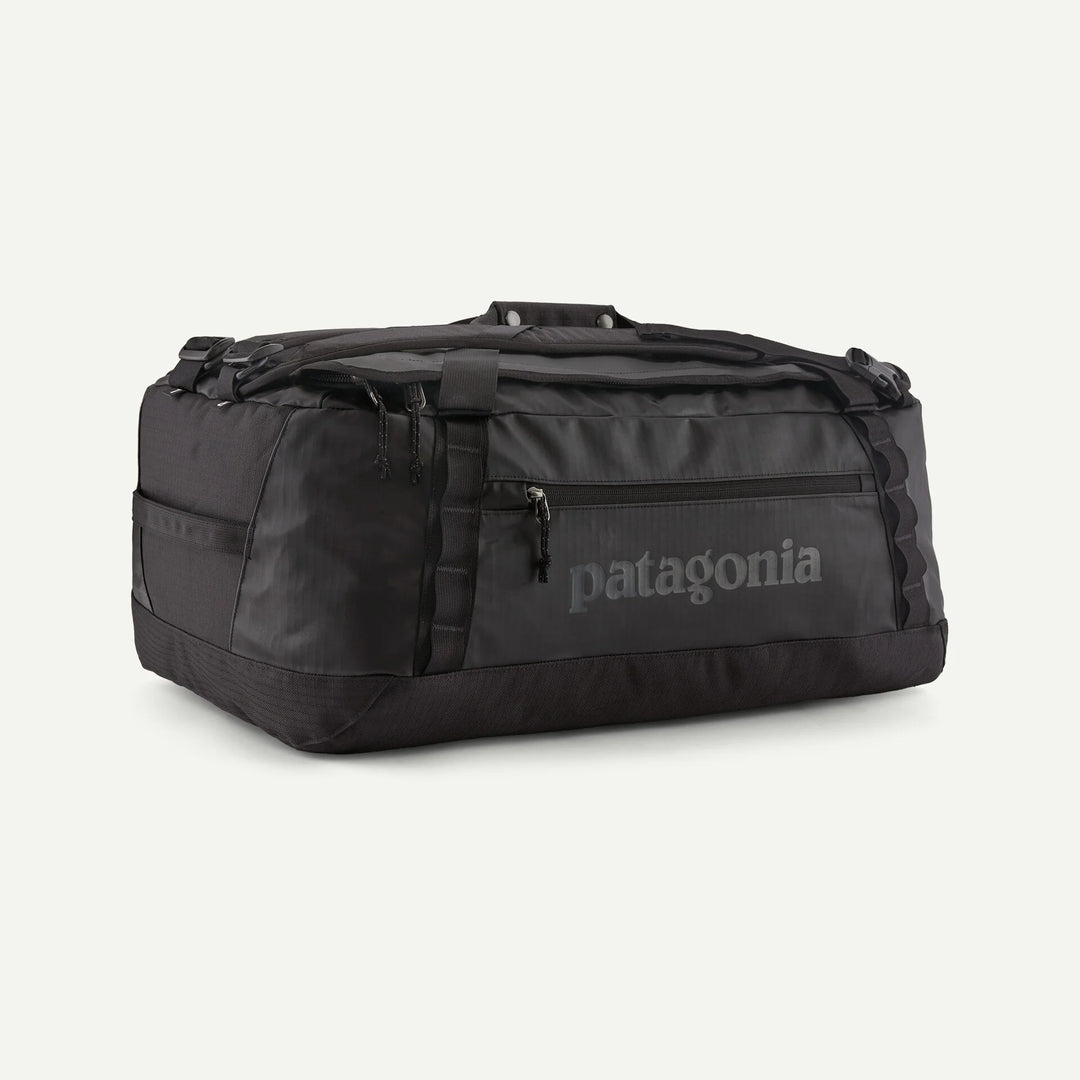 Black duffel bag with Patagonia logo on a white background