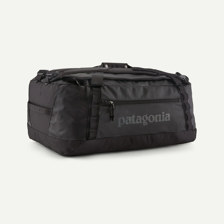 Black duffel bag with Patagonia logo on a white background
