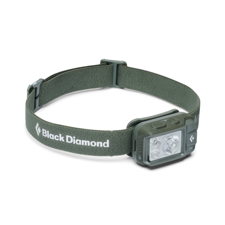 Black Diamond headlamp with an olive green adjustable fabric headband and a dark gray light module, shown on a clean white background.