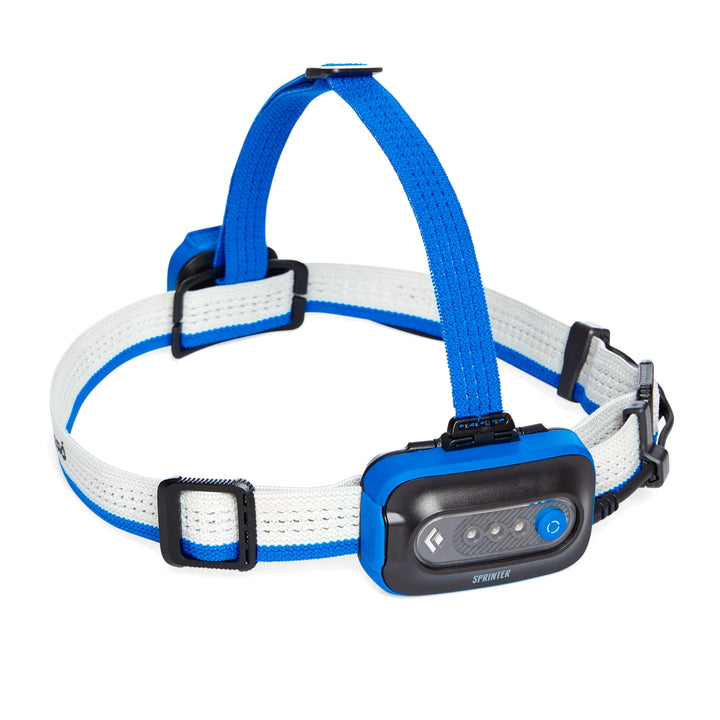 Blue and white dog collar with electronic device on a white background