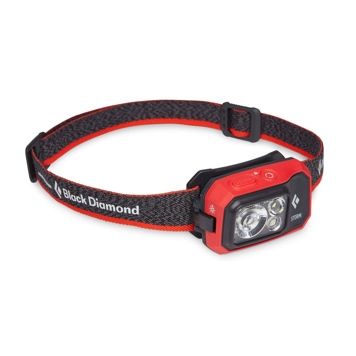 Red and black headlamp on a white background