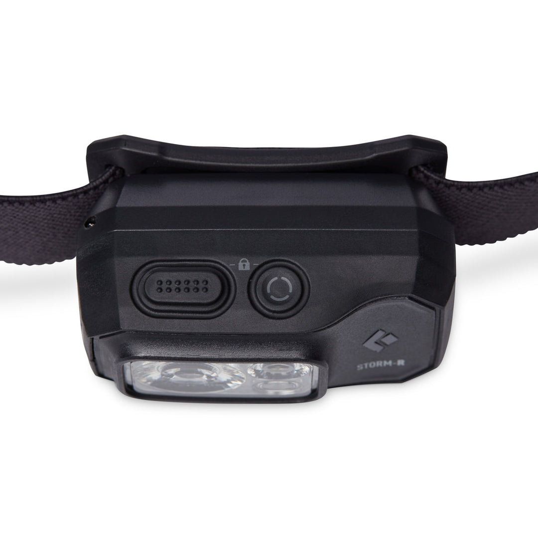 Close up of the front of a head torch from above showing two buttons.