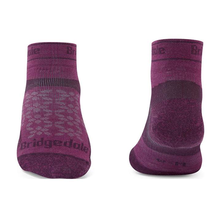 A pair of low-cut athletic socks shown from the front and back on a plain white background. The socks are heathered dark purple with darker purple accents on the heel, toe, and sole, and feature the &