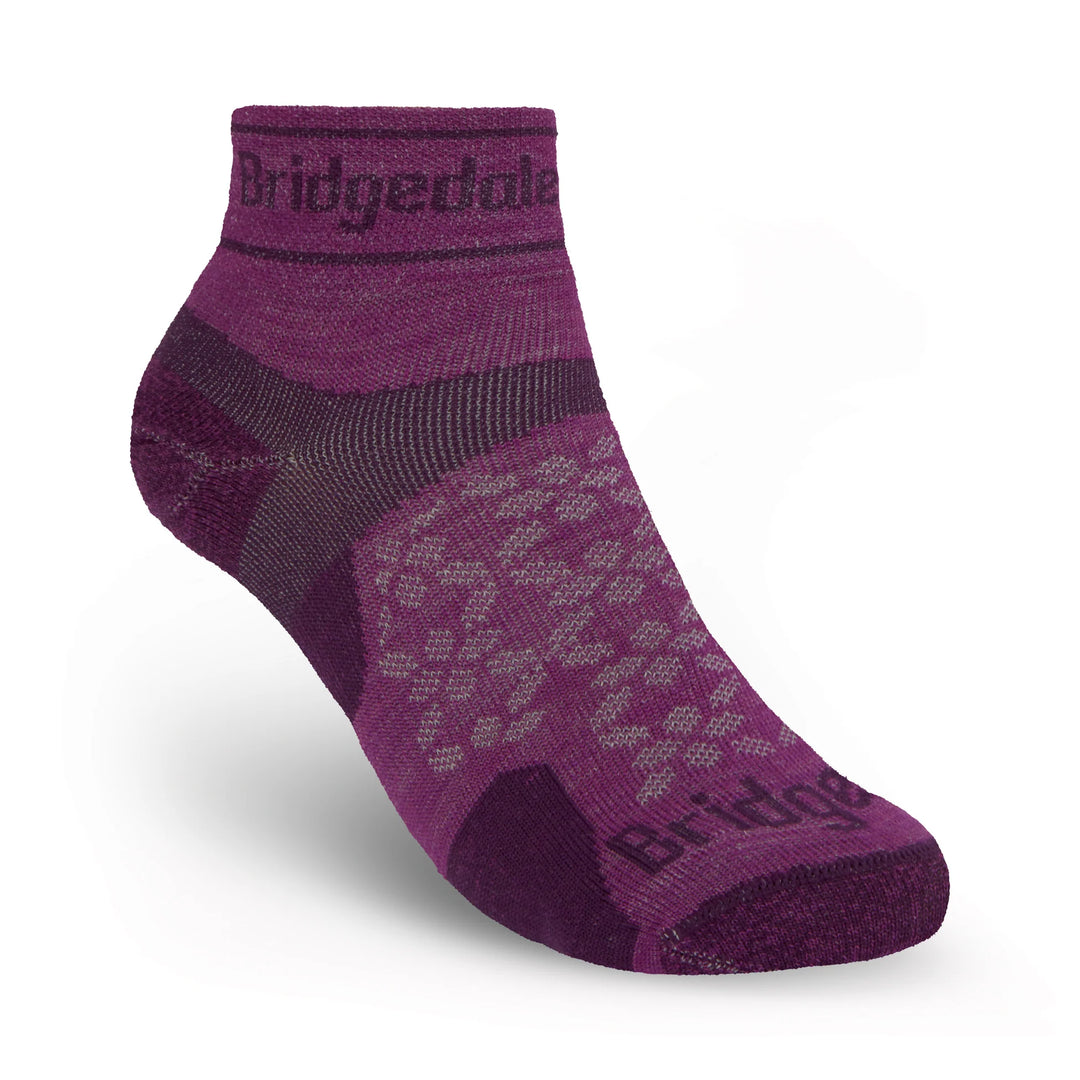 Purple sock with Bridgedale branding on a white background