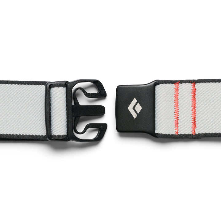 Two belt straps with a black buckle on a white background