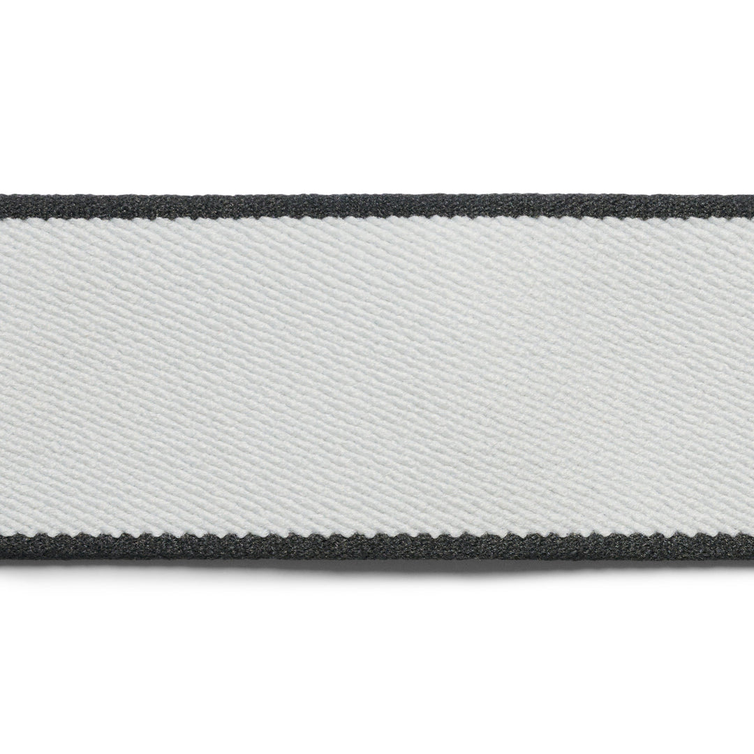 Close-up of a gray and black striped belt on a white background