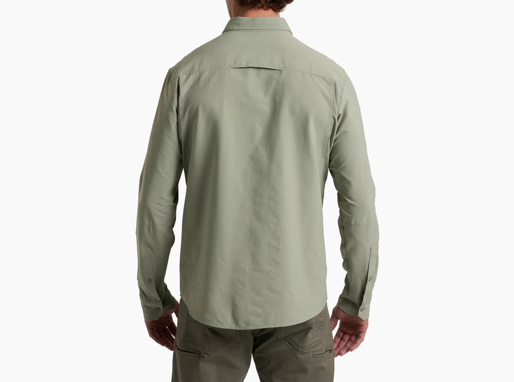 Person wearing a grey shirt and pants on a white background