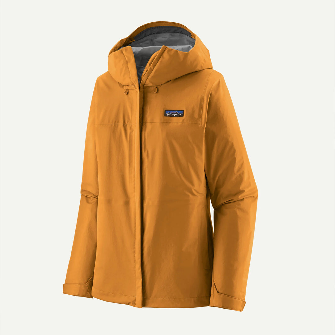 A Patagonia hooded jacket in a warm golden-brown or ochre color, shown against a plain off-white background. The Patagonia logo is visible on the left chest.