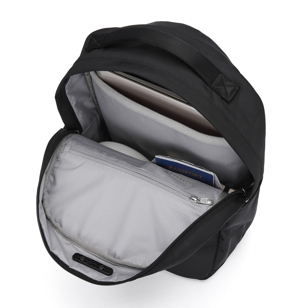 Black backpack with white lining unzipped to show various internal pockets