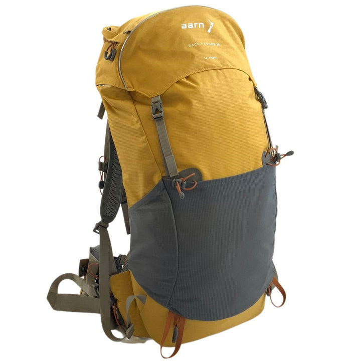 Yellow and grey backpack on a white background