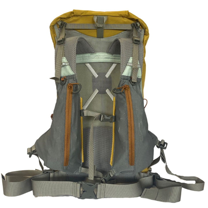 View of the straps of a yellow and grey backpack