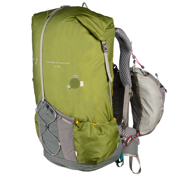 Green hiking backpack with grey straps on a white background