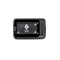 A Black Diamond cap 1500 Li-ion battery shown inside its black charging dock on a clean white background.