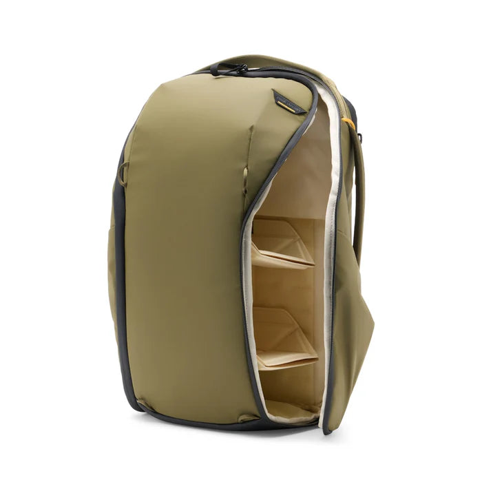 Khaki backpack with a white interior on a white background
