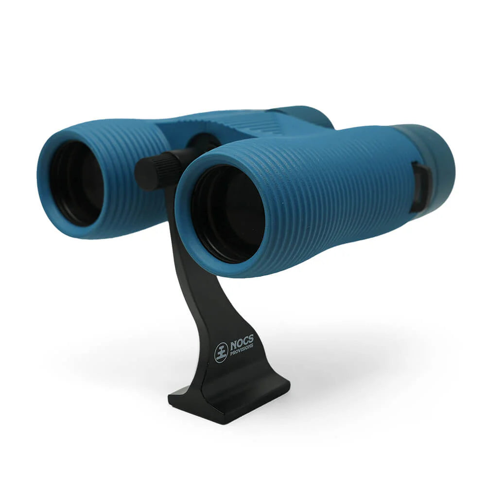 Blue binoculars with a black stand on a white background