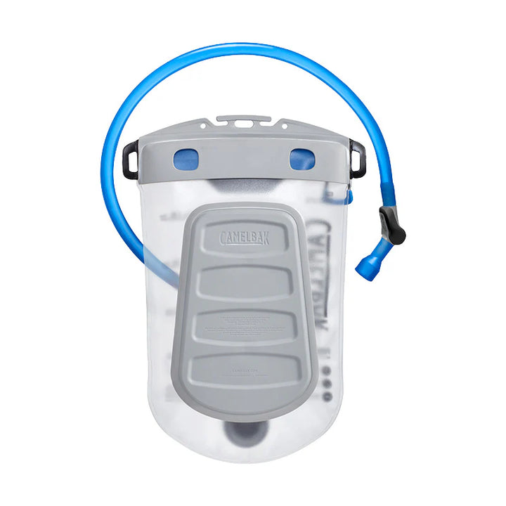 Clear CamelBak hydration bladder with blue hose on a white background
