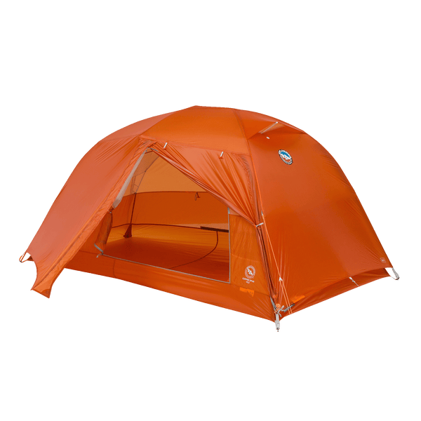 Orange hiking tent with door partially rolled away to the side