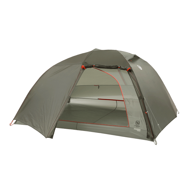 Dark green hiking tent with red accents and door rolled up and out of the way