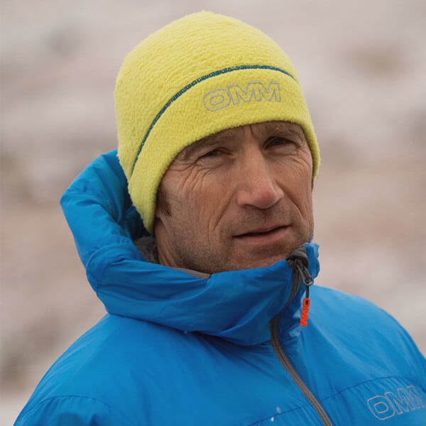 OMM Core Beanie worn on the trail