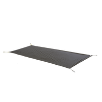 Dark gray tent footprint with webbing straps on the corners