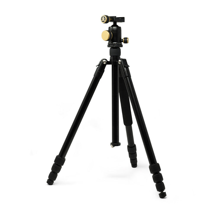 Black tripod with gold fittings on a white background