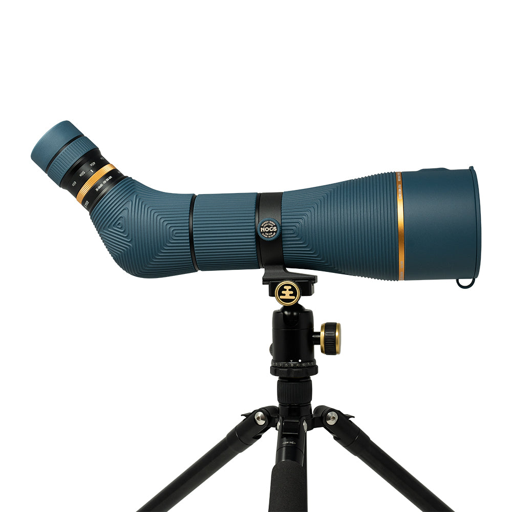 Blue and gold optical spotting scope mounted on black tripod against a white background.