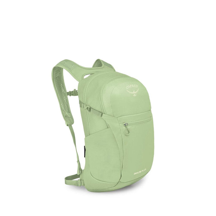 A light sage green Osprey backpack shown from a three-quarter rear angle against a plain white background.