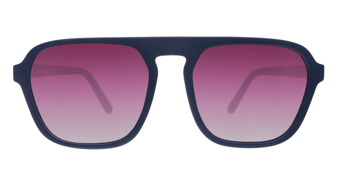 Sunglasses with black frames and pink gradient lenses on a white background