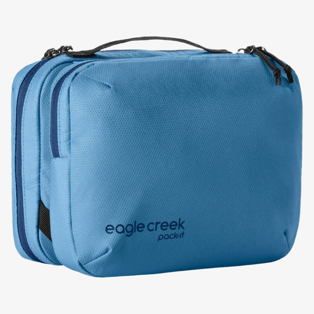 Blue travel organiser with 'eagle creek pack-it' branding on a white background