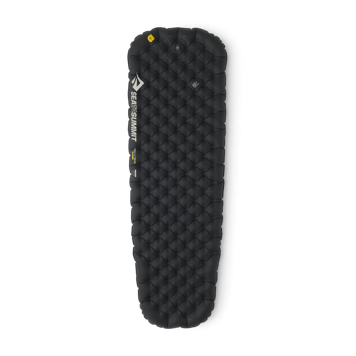 Black inflatable sleeping mat with a mummy shape on a white background