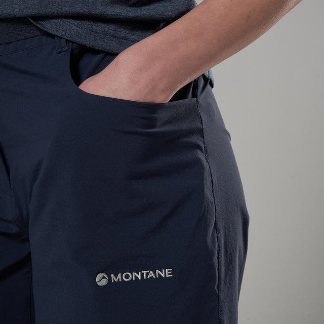 Navy shorts with Montane logo on a grey background