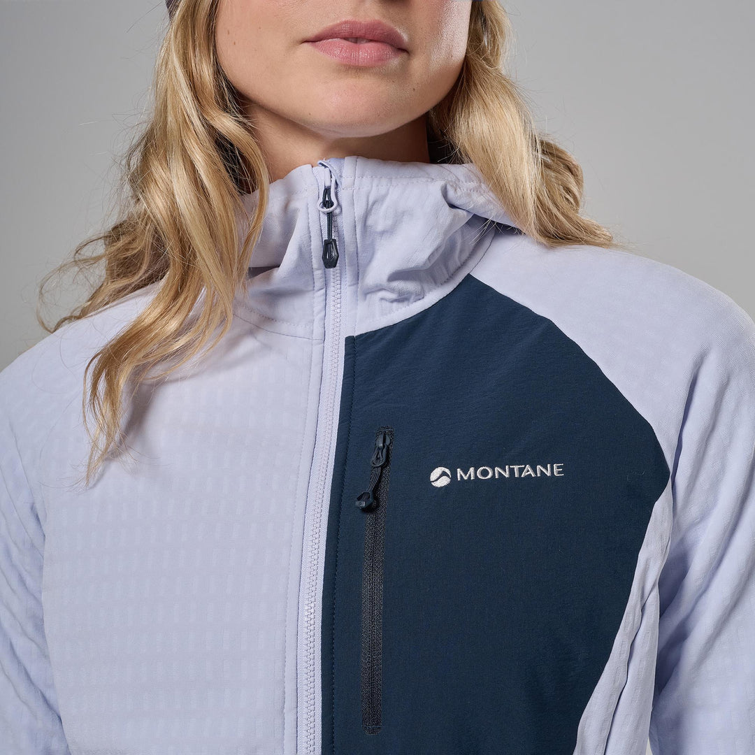 Close-up of a woman wearing a Montane outdoor jacket in light gray and navy blue, showing the brand logo on the chest.