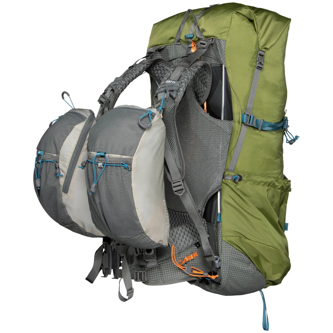 Green and gray Aarn backpack with multiple compartments on a white background