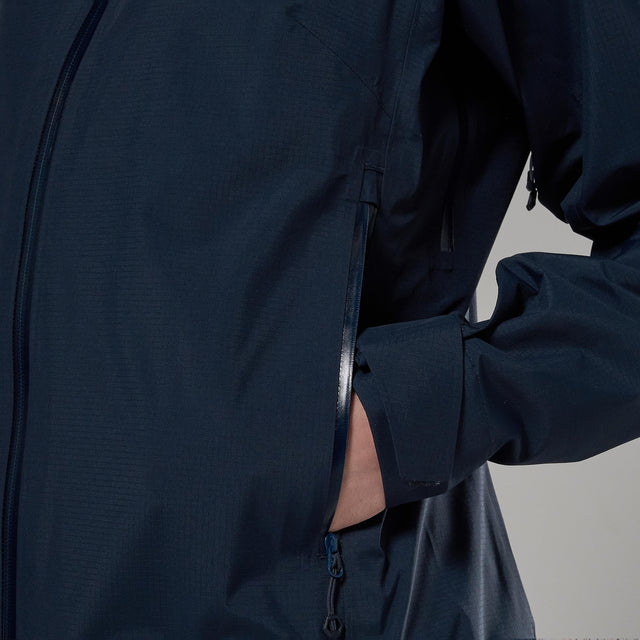 Close-up of the pocket of navy blue rain jacket