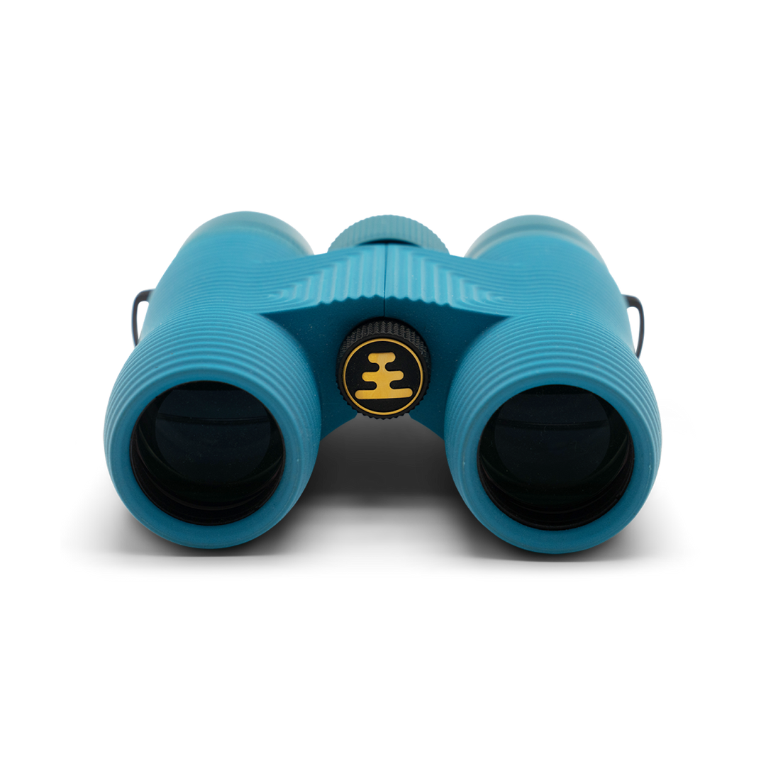 Compact blue binoculars with Nocs Provisions logo on a white background