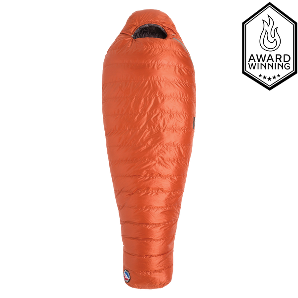 Orange sleeping bag on a white background