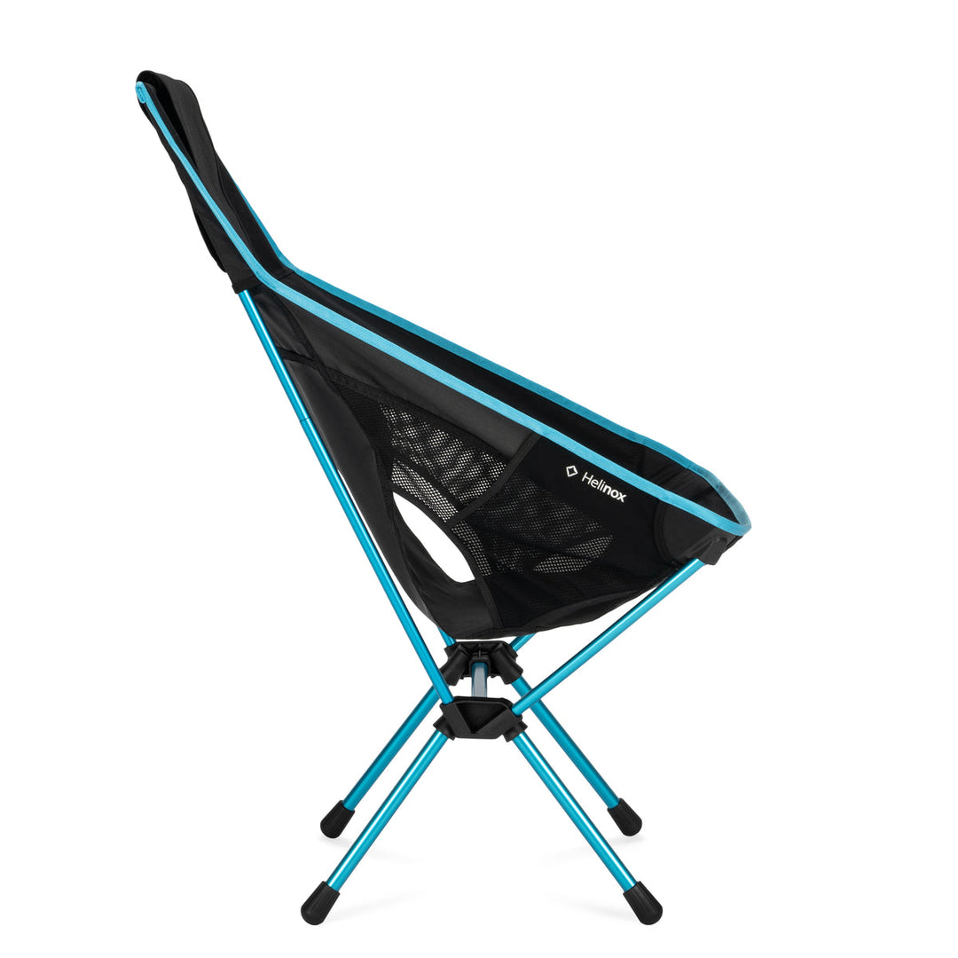 Black and blue camping chair with Helinox logo on a white background