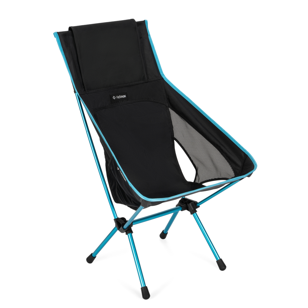 A black and gray camping chair with a bright blue frame, shown on a clean white background. The brand name 'Helinox' is visible on the upper backrest.