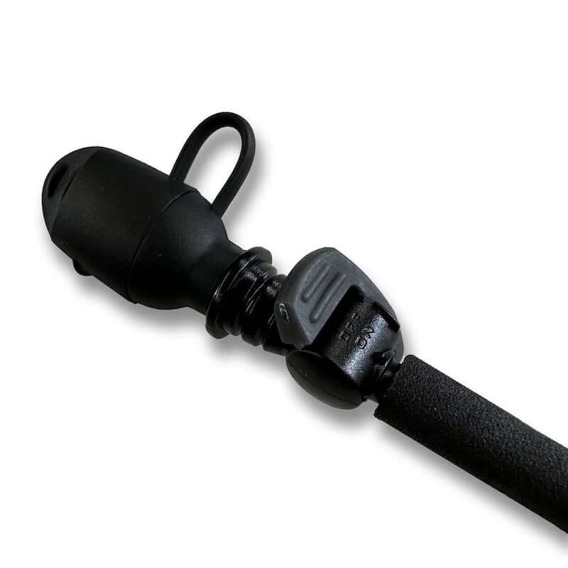Black bite valve with cover on white background