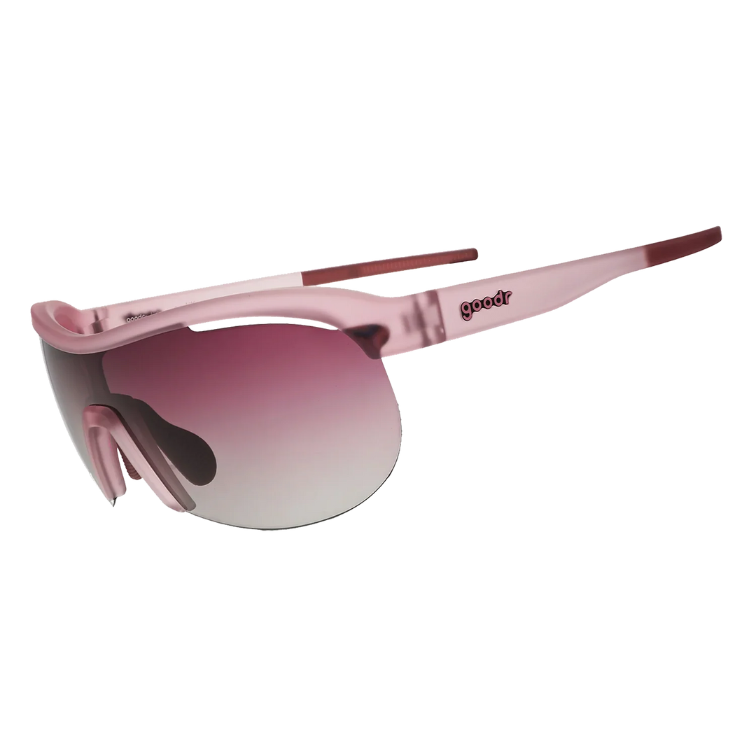 Pink sunglasses with a gradient lens on a white background
