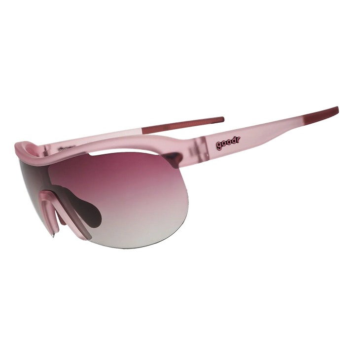 Pink sunglasses with a gradient lens on a white background