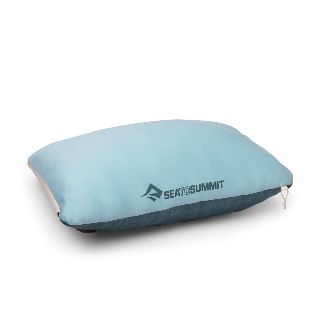 Light blue camping pillow with Sea to Summit Logo on a white background