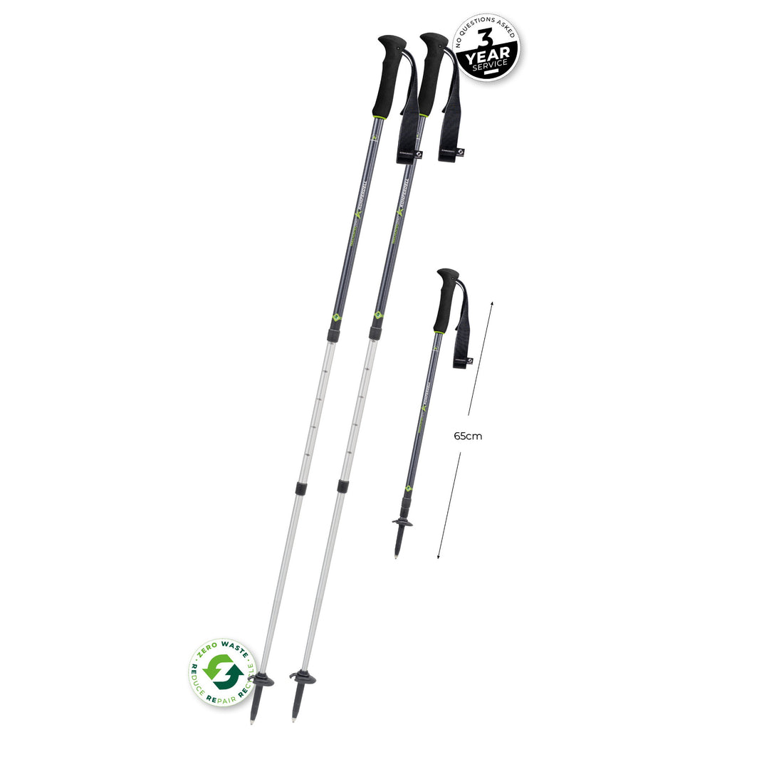 Two black and silver hiking poles with measurement details on a white background