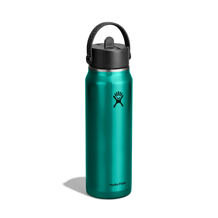 A Hydro Flask insulated water bottle in metallic teal green with a black lid and carrying loop, shown on a clean white background with a soft shadow.