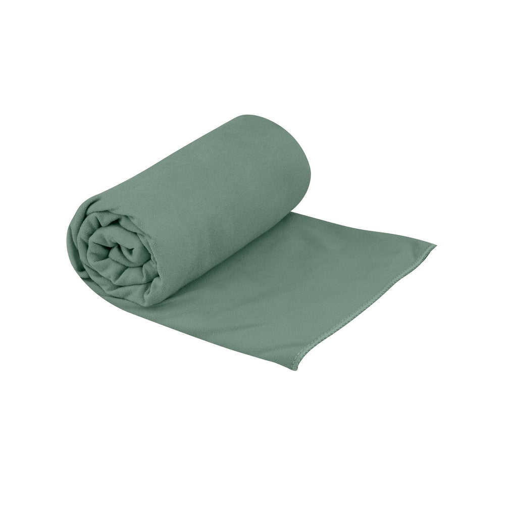 A rolled up green travel towel