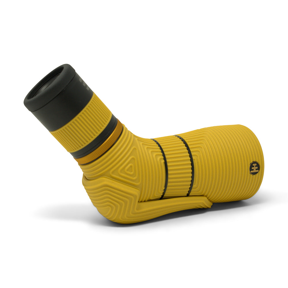 Yellow and black textured spotting scope on a white background