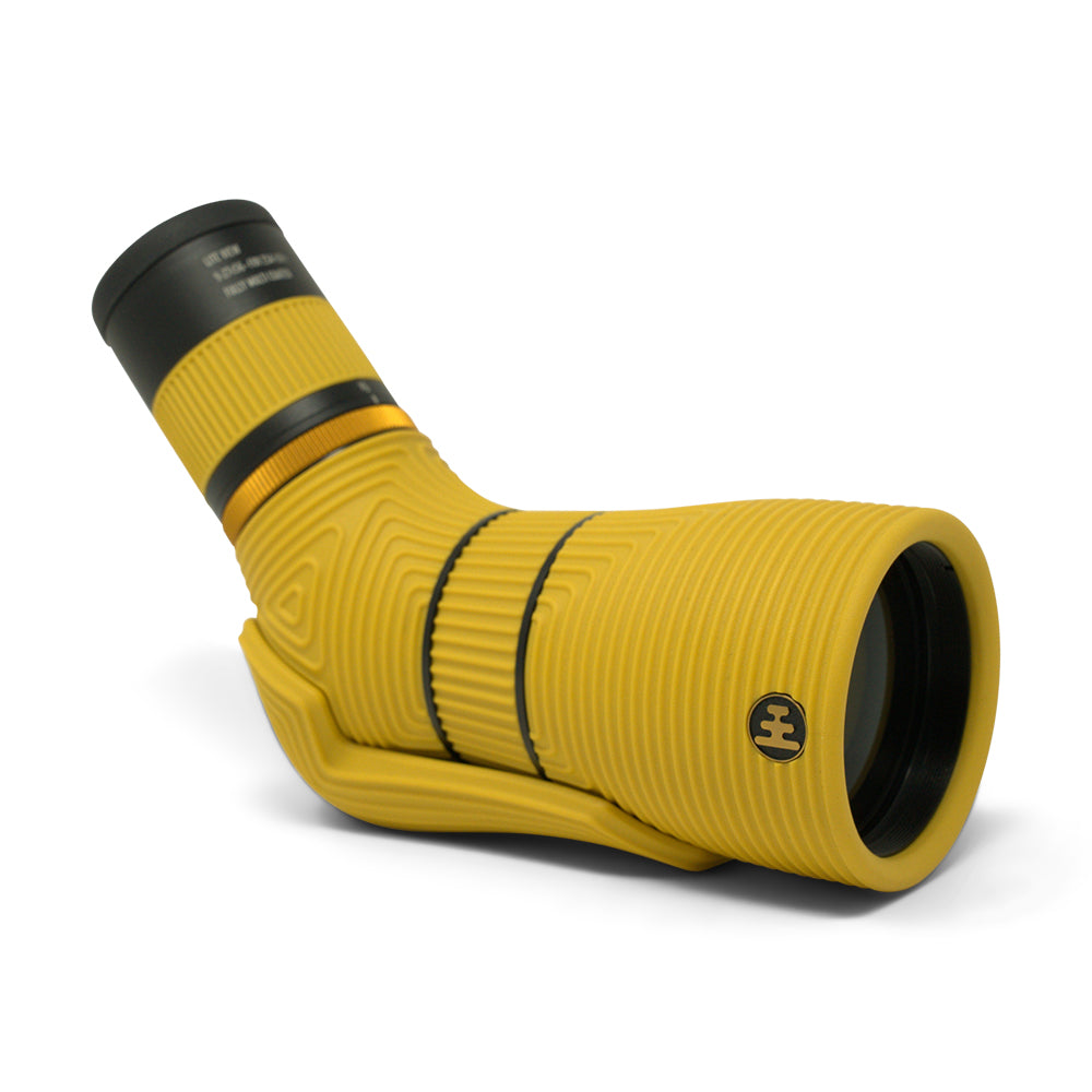 Yellow spotting scope on white background